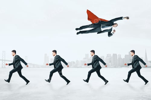 Preview: Super Businessman Flying Over Row Of Other Businessmen On City Background. Different Direction And
