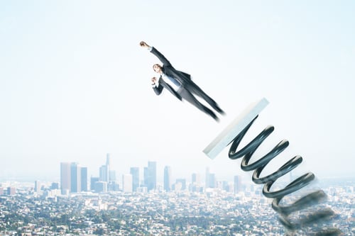 Preview: Businessman In Suit On Start Up Mechanism. Modern City Background. Entrepreneurship And Launching
