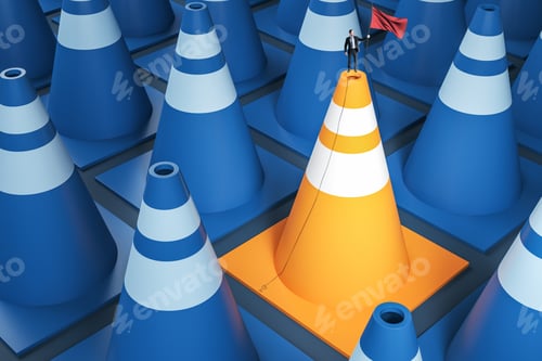Preview: Businessman With Victory Flag Standing On Yellow And Blue Traffic Cone. Success And Leadership