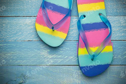 Preview: Colorful Beach Flip Flop On Wooden Background