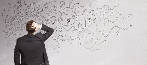 Preview: Pensive Businessman With Abstract Arrows Sketch On Concrete Wall Background. Confusion And