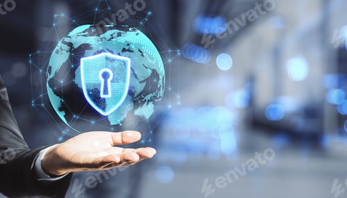 Preview: Close Up Of Hand Holding Abstract Glowing Globe Hologram With Security Shield Icon On Blurry Office