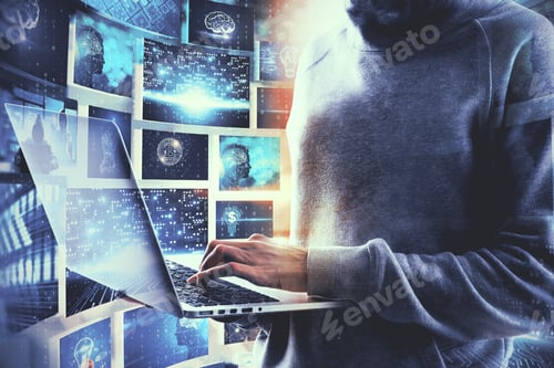 Preview: Unrecognizable Hacker Using Laptop Computer With Abstract Digital Business Picture Interface