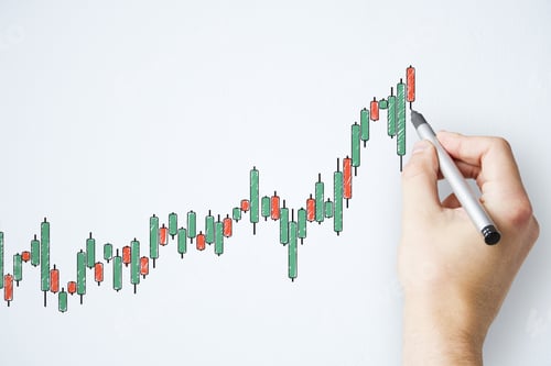 Preview: Businessman Hand With Pen Drawing Creative Color Candlestick Chart On White Wall. Increase And