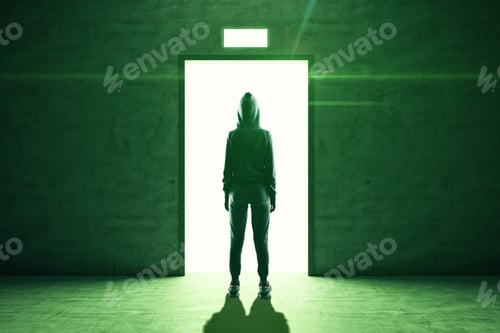 Preview: Hacker Stands In Front Of An Open Elevator Door From Whicha Green Light Emanates. Business And