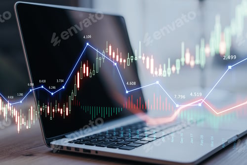 Preview: Close Up Of Laptop Computer On Desktop With Glowing Forex Chart Trading Interface On Blurry