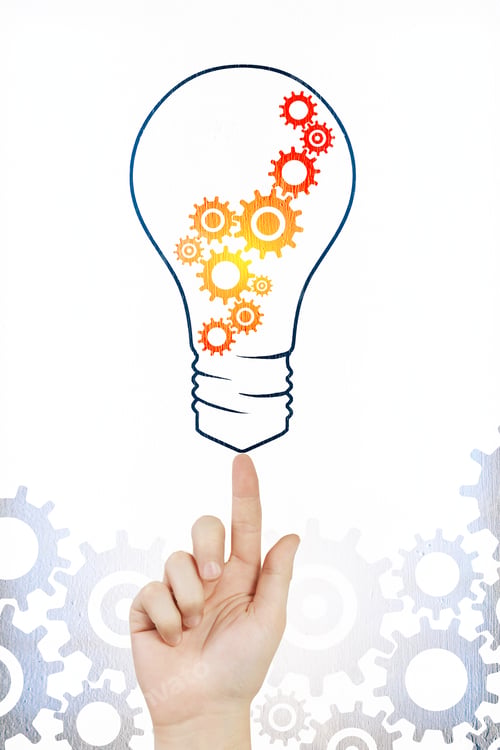 Preview: Hand Pointing At Creative Cogwheel Lamp Sketch On Subtle White Background. Idea And Machinery