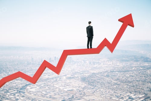 Preview: Businessman Standing On Red Arrow And Looking To City. Business And Financial Success Concept.