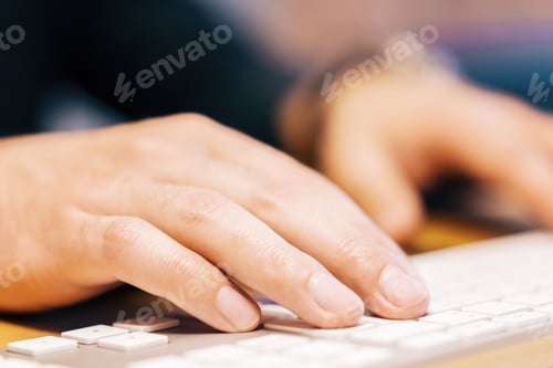 Preview: Close Up Of Businessman Hands Typing On White Computer Keyboard. Blurry Background. Technology And