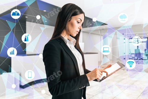 Preview: Side View Of Attractive Young Businesswoman Using Tablet On Blurry Office Interior Background With