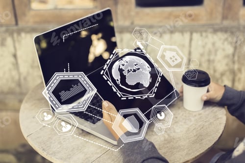 Preview: Businessman At Small Cafe Table With Coffee Cup Using Laptop And Tablet With Digital Business