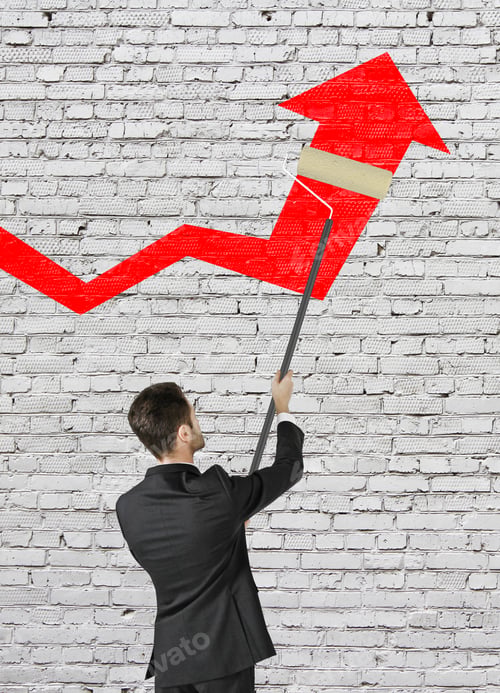 Preview: Businessman Painting Big Red Arrow On Brick Wall