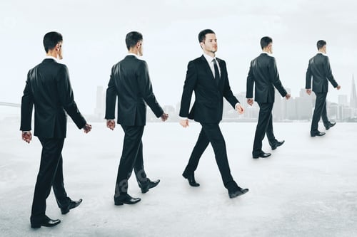 Preview: Rows Of Businessmen Walking On Light Background. Teamwork And Success Concept