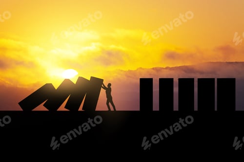 Preview: Backlit Man Stopping Abstract Wooden Domino Blocks On Bright Sunset Sky Background With Mock Up