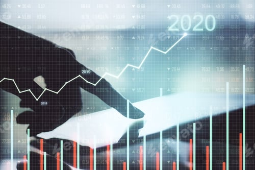 Preview: Hand Using Of Tablet On Desktop With Glowing Graph Of Success In 2020 Year Hologram. Analytics And