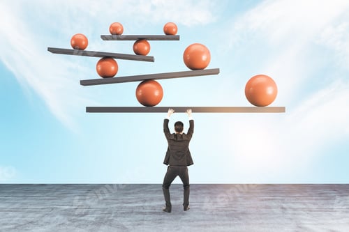 Businessmen Holding Scales With Red Ball On Blue Sky Background. Business And Challenge Concept.