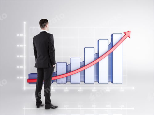 Preview: Businessman In Suit Looking On Chart