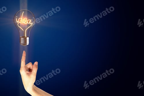 Preview: Hand With Creative Glowing Idea Lamp On Blue Smoke Background With Copy Space. Innovation And