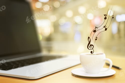 Visualização: Xícara de café, laptop e notas musicais, conceito