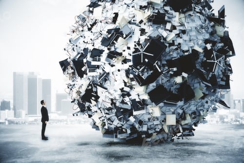 Preview: Businessman And Big Heap Of Office Stuff At City Background