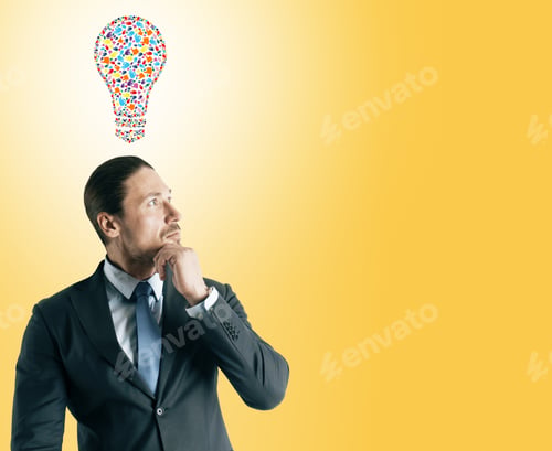 Preview: Thoughtful Young Businessman With Creative Hand Gesture Lightbulb On Orange Background