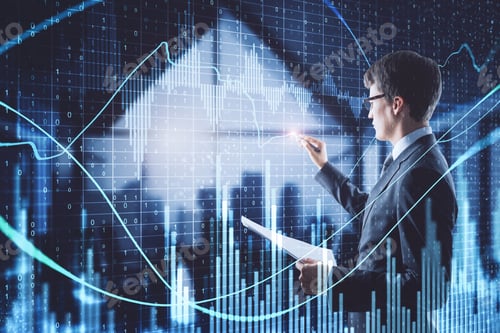 Preview: Side View Of Attractive Young European Businessman Using Forex Chart Interace On Blurry Office