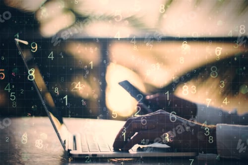 Preview: Hand Using Laptop With Number On Blurry Desktop Backround. Programming And Communication Concept.