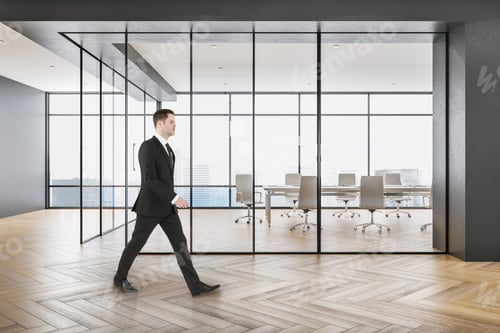 Preview: Businessman Walking In Meeting Room Interior And Looking To City.