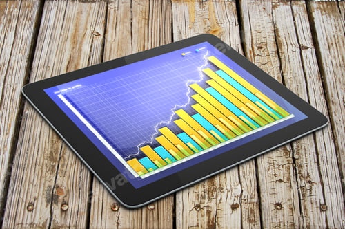 Preview: Digital Tablet With Business Chart On A Screen On Wooden Table
