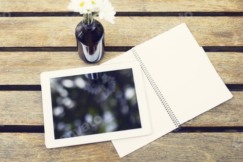 Preview: Digital Tablet With Blank Diary On A Wooden Table