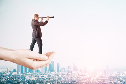 Preview: Research And Success Concept. Hand Holding Businessman With Telescope On Sky Background With Copy