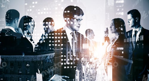 Preview: Double Exposure Of Group Of Business People Working On The Background Of The City