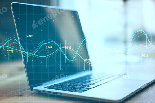 Preview: Laptop Computer With Stock Chart And Financial Analytics On Blurry Desktop Backround. Finance And
