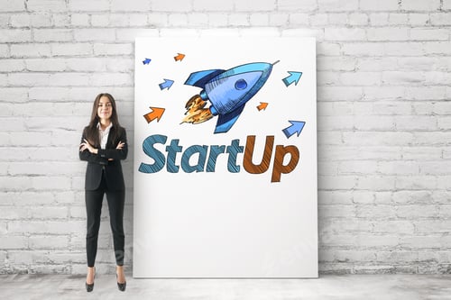 Preview: Portrait Of Attractive Young Businesswoman With Folded Arms Standing Next To Rocket Drawing On