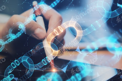 Preview: Close Up Of Hands Using Digital Tablet With Creative Glowing Blockchain Hologram On Blurry Desktop