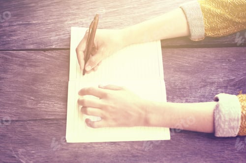 Preview: Girl Writing With Pen In Blank Diary On Wooden Table, Instagram Photo Effect