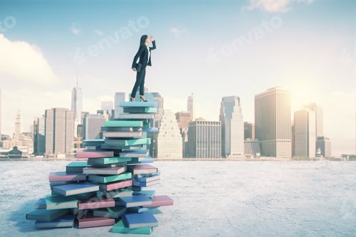 Preview: Career And Education Concept With Businesswoman On Book Mountain Looking Into The Distance At City