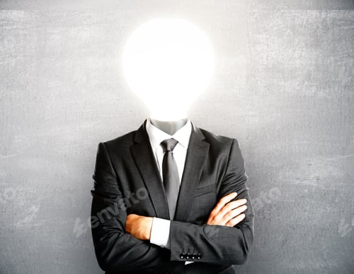 Preview: Idea Concept With Lamp Headed Businessman On Light Concrete Wall Background