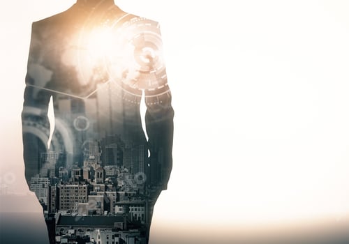 Preview: Unrecognizable Businessman In Suit Standing On Abstract City Background With Blurry Business