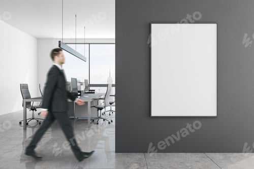 Preview: Young Businessman In Contemporary Office Interior With Copy Space On Wall And Daylight. Mock Up,