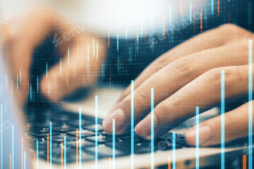 Preview: Close Up Of Hands Using Laptop Keyboard With Forex Chart On Desktop And Blurry Bokeh Background