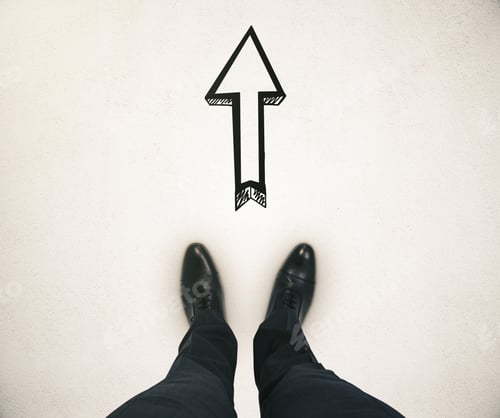 Preview: Guidance Concept With Businessman Feet And Arrow Sketch Showing Direction On Light Beige Ground