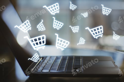 Preview: Close Up Of Laptop With Abstract Glowing Cart Icons On Blurry Background. Online Shopping