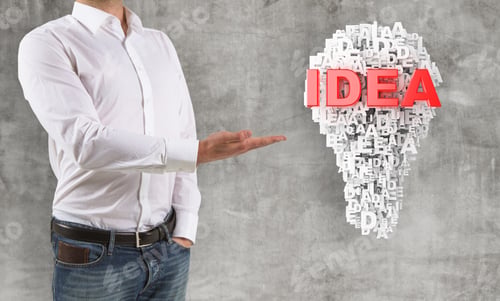 Preview: Man Shows To Idea Symbol On Wall Background
