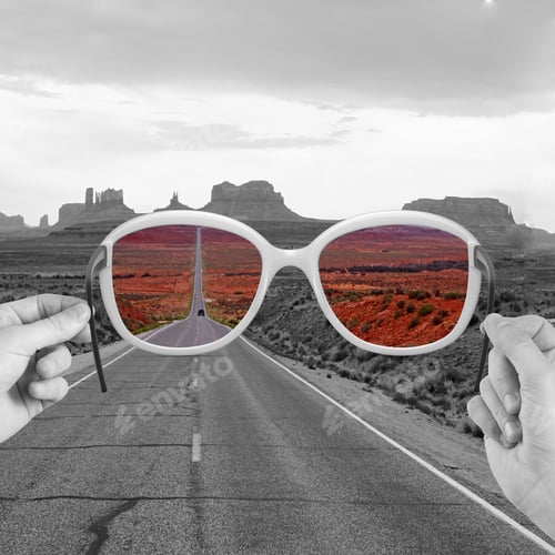 Preview: Hand Holding Glasses Looking To Modern Skyscraper