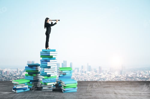 Preview: Young Businesswoman With Binocular Standing On Color Books On City Background. Growth, Knowledge