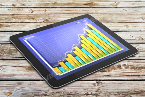 Preview: Business Graph On Digital Tablet Screen On Wooden Table