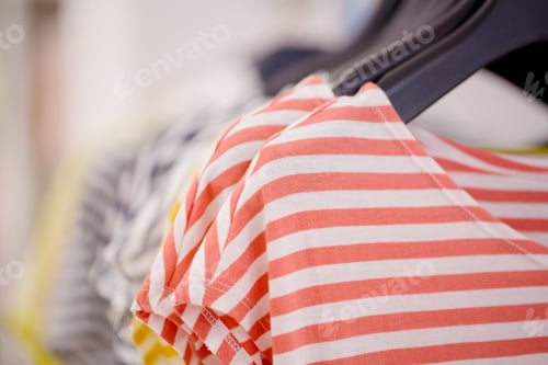 Preview: Fashion Clothing On Hangers At The Shop