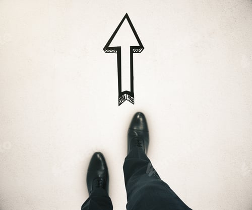 Preview: Guidance Concept With Businessman Feet And Arrow Sketch Showing Direction On Light Ground