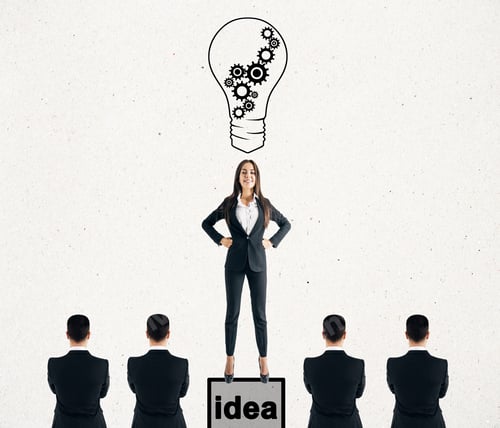 Preview: Happy European Businesswoman With Drawn Light Bulb Standing On Pedestal On Subtle White Background